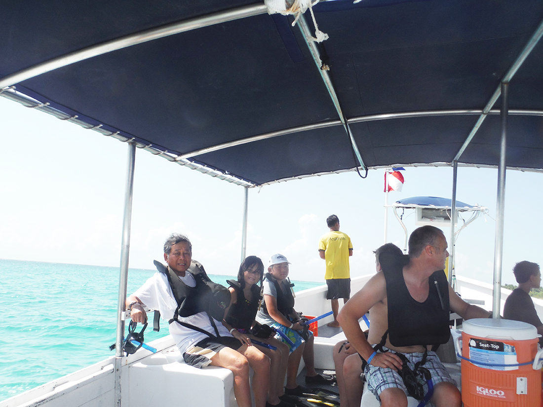 On the boat to the snorkeling site
