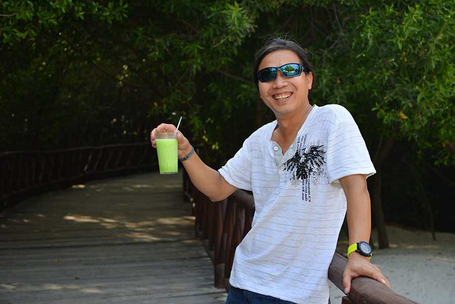 After making reservations to the specialty dinner, we walked to the beach to find something to eat.  Tim loved his first drink in this hotel.
